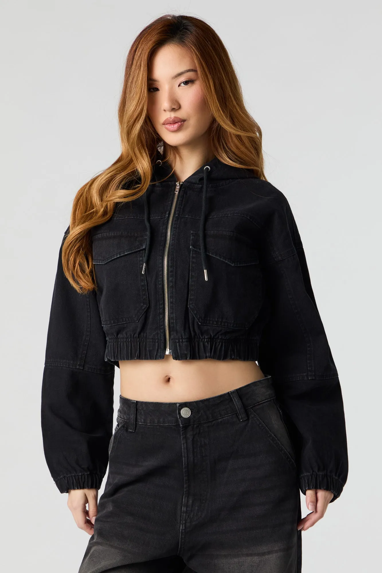 Haut à capuchon en denim court avec fermeture à glissière